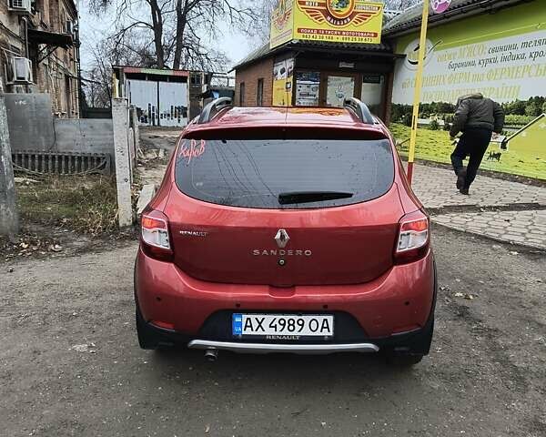 Красный Рено Сандеро СтэпВэй, объемом двигателя 1.5 л и пробегом 143 тыс. км за 8100 $, фото 1 на Automoto.ua
