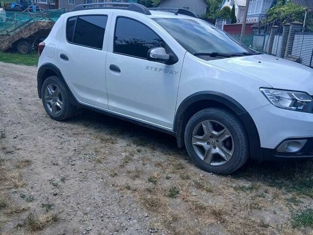 Белый Рено Сандеро, объемом двигателя 1.46 л и пробегом 133 тыс. км за 9500 $, фото 1 на Automoto.ua