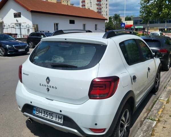 Білий Рено Сандеро, об'ємом двигуна 1.5 л та пробігом 60 тис. км за 12000 $, фото 1 на Automoto.ua