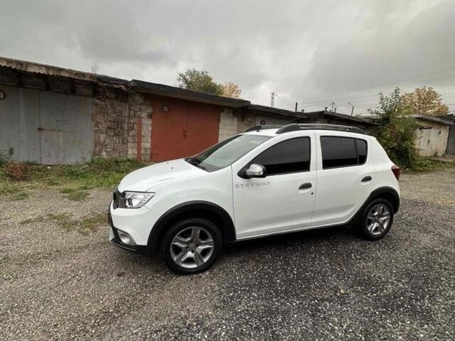 Білий Рено Сандеро, об'ємом двигуна 0.9 л та пробігом 57 тис. км за 9500 $, фото 1 на Automoto.ua