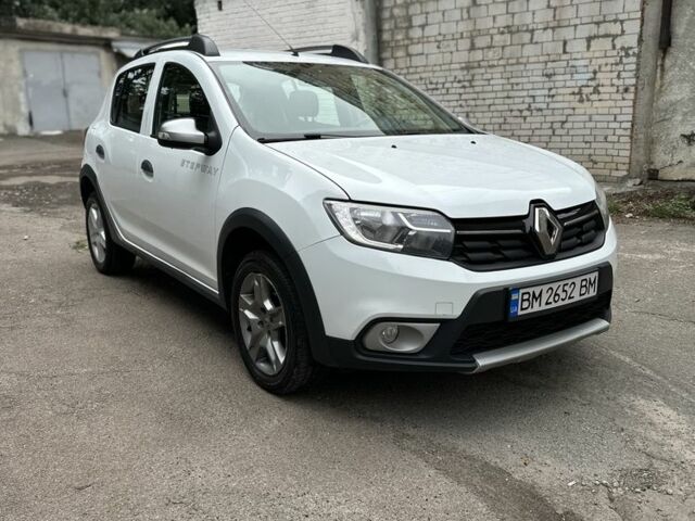 Белый Рено Сандеро, объемом двигателя 0.9 л и пробегом 276 тыс. км за 7500 $, фото 1 на Automoto.ua