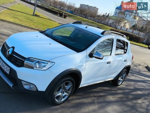 Белый Рено Сандеро, объемом двигателя 1.46 л и пробегом 65 тыс. км за 12400 $, фото 1 на Automoto.ua
