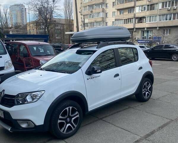 Белый Рено Сандеро, объемом двигателя 1.46 л и пробегом 58 тыс. км за 13300 $, фото 1 на Automoto.ua