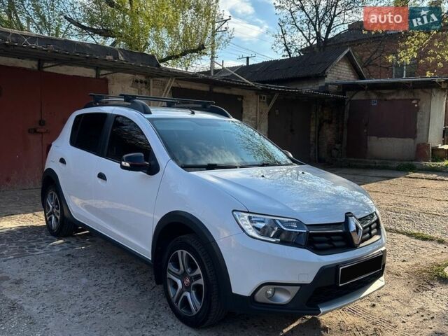 Белый Рено Сандеро, объемом двигателя 1.46 л и пробегом 58 тыс. км за 11800 $, фото 1 на Automoto.ua
