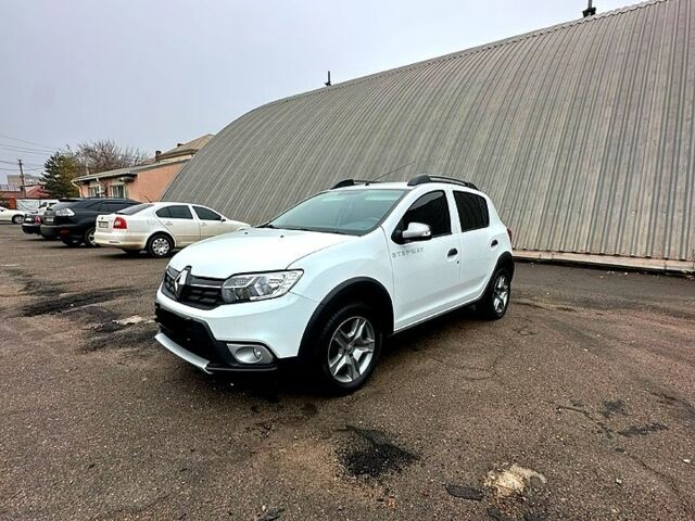 Білий Рено Сандеро, об'ємом двигуна 1.5 л та пробігом 58 тис. км за 10999 $, фото 1 на Automoto.ua