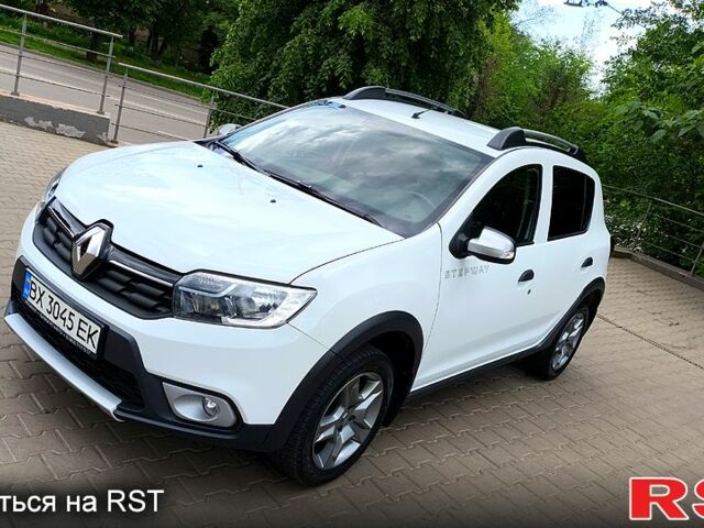 Белый Рено Сандеро, объемом двигателя 1.5 л и пробегом 66 тыс. км за 12000 $, фото 1 на Automoto.ua