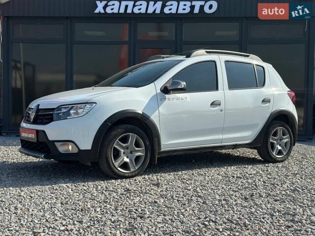 Белый Рено Сандеро, объемом двигателя 1.46 л и пробегом 142 тыс. км за 11999 $, фото 1 на Automoto.ua