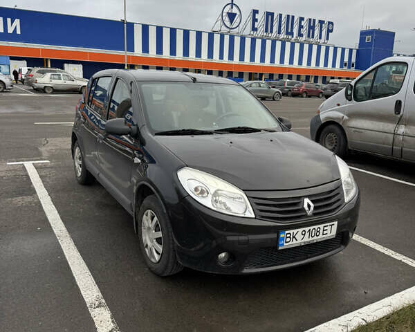 Черный Рено Сандеро, объемом двигателя 1.39 л и пробегом 112 тыс. км за 6000 $, фото 1 на Automoto.ua