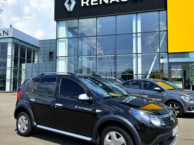 Черный Рено Сандеро, объемом двигателя 1.6 л и пробегом 150 тыс. км за 11300 $, фото 1 на Automoto.ua