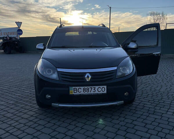 Черный Рено Сандеро, объемом двигателя 1.6 л и пробегом 98 тыс. км за 6600 $, фото 1 на Automoto.ua