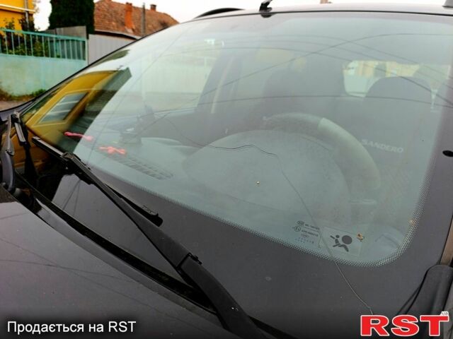 Черный Рено Сандеро, объемом двигателя 1.6 л и пробегом 138 тыс. км за 6600 $, фото 1 на Automoto.ua