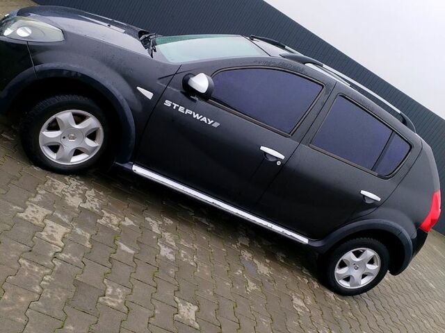 Черный Рено Сандеро, объемом двигателя 1.6 л и пробегом 60 тыс. км за 6999 $, фото 1 на Automoto.ua