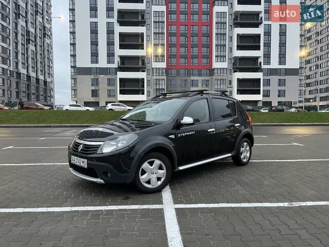 Черный Рено Сандеро, объемом двигателя 1.6 л и пробегом 132 тыс. км за 7500 $, фото 1 на Automoto.ua