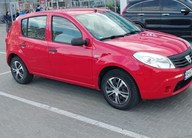 Червоний Рено Сандеро, об'ємом двигуна 1.4 л та пробігом 131 тис. км за 4400 $, фото 1 на Automoto.ua