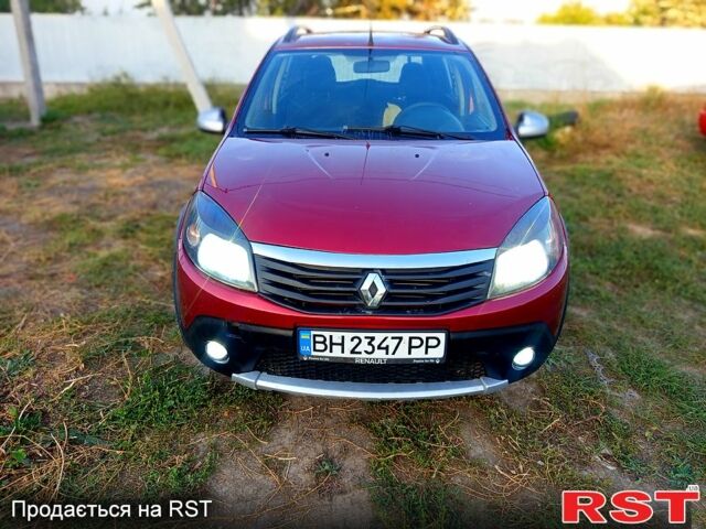 Червоний Рено Сандеро, об'ємом двигуна 1.6 л та пробігом 250 тис. км за 4800 $, фото 1 на Automoto.ua