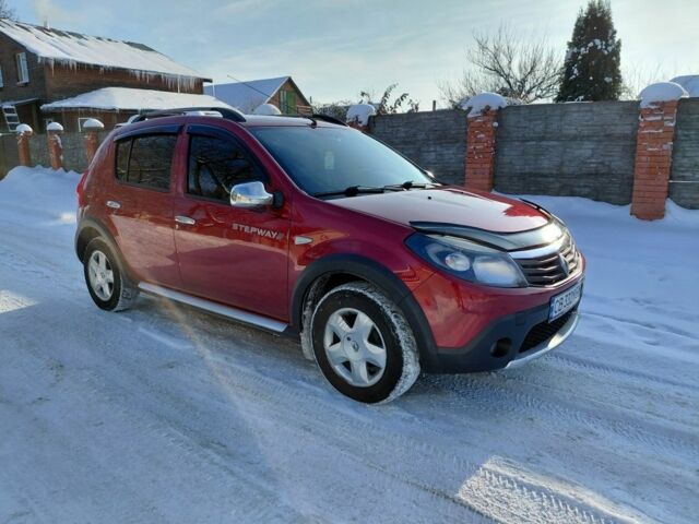 Красный Рено Сандеро, объемом двигателя 1.6 л и пробегом 101 тыс. км за 6700 $, фото 1 на Automoto.ua