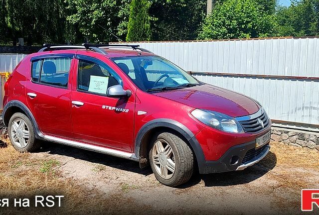Красный Рено Сандеро, объемом двигателя 1.6 л и пробегом 198 тыс. км за 5300 $, фото 1 на Automoto.ua