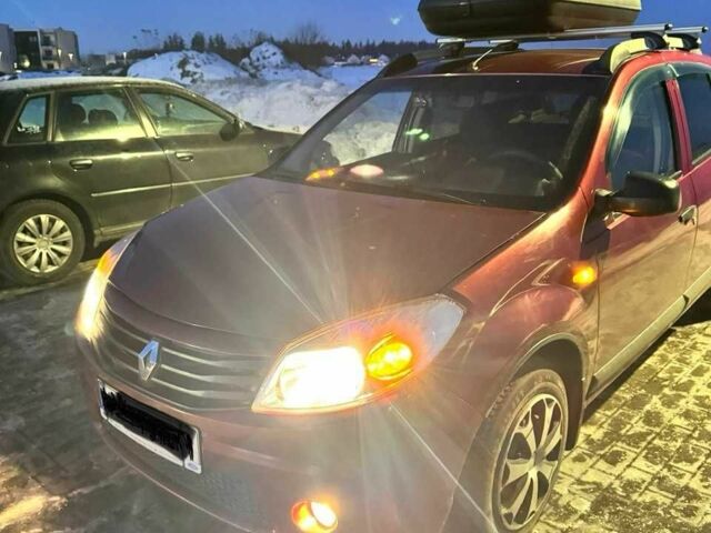 Червоний Рено Сандеро, об'ємом двигуна 1.4 л та пробігом 103 тис. км за 6000 $, фото 1 на Automoto.ua
