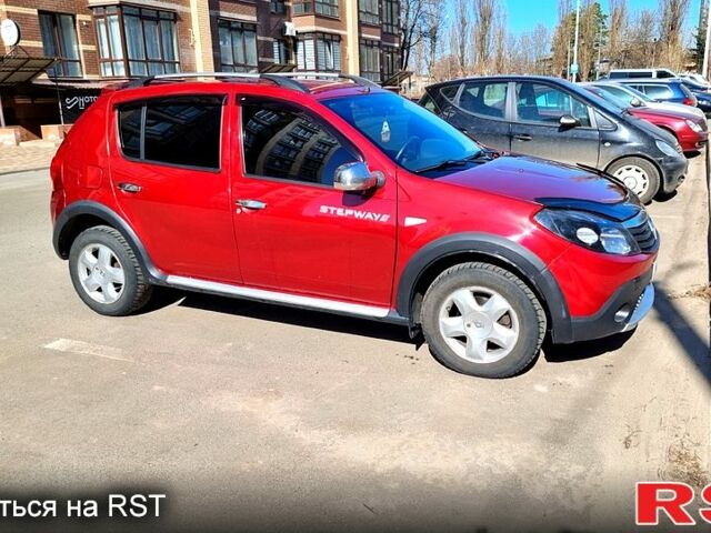 Красный Рено Сандеро, объемом двигателя 1.6 л и пробегом 110 тыс. км за 7500 $, фото 1 на Automoto.ua