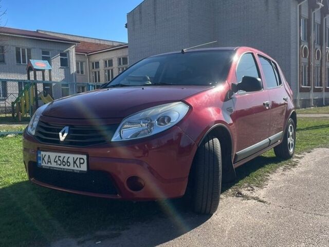 Красный Рено Сандеро, объемом двигателя 1.6 л и пробегом 124 тыс. км за 5800 $, фото 1 на Automoto.ua