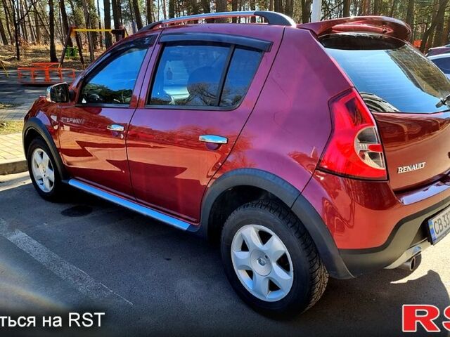 Красный Рено Сандеро, объемом двигателя 1.6 л и пробегом 110 тыс. км за 7500 $, фото 1 на Automoto.ua