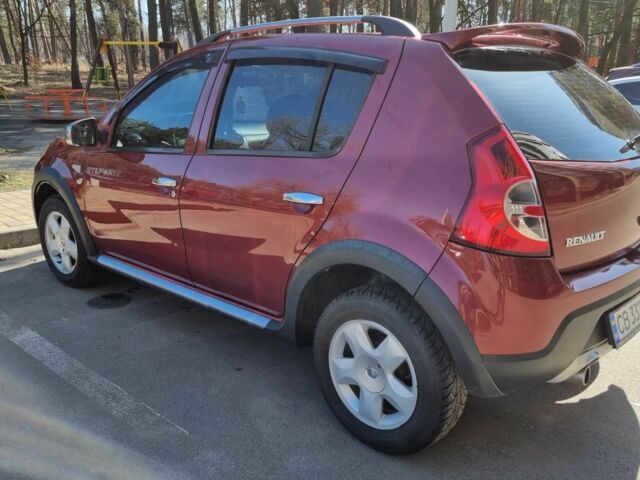 Красный Рено Сандеро, объемом двигателя 1.6 л и пробегом 110 тыс. км за 7490 $, фото 1 на Automoto.ua