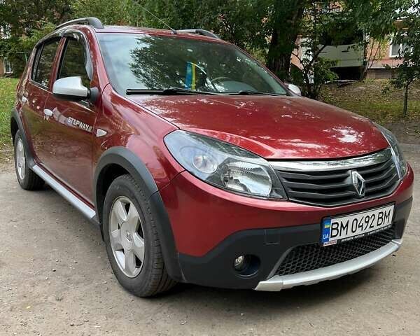Красный Рено Сандеро, объемом двигателя 1.6 л и пробегом 96 тыс. км за 6500 $, фото 1 на Automoto.ua