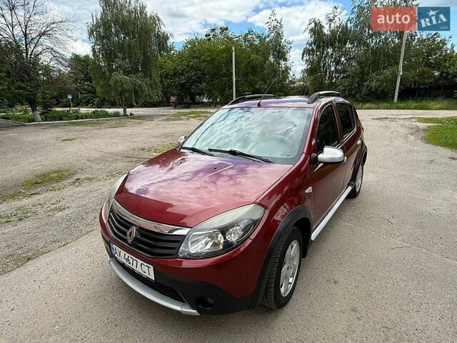 Красный Рено Сандеро, объемом двигателя 1.6 л и пробегом 55 тыс. км за 7000 $, фото 1 на Automoto.ua