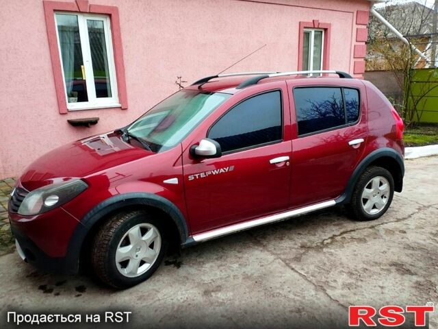 Червоний Рено Сандеро, об'ємом двигуна 1.6 л та пробігом 167 тис. км за 5950 $, фото 1 на Automoto.ua