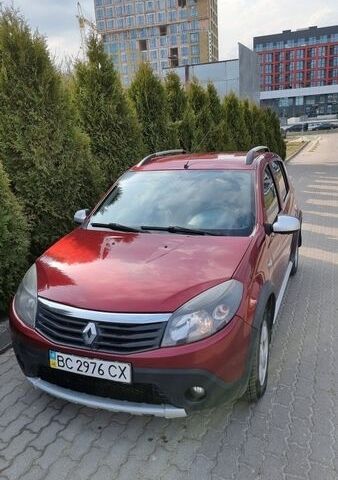 Красный Рено Сандеро, объемом двигателя 1.6 л и пробегом 163 тыс. км за 6500 $, фото 1 на Automoto.ua
