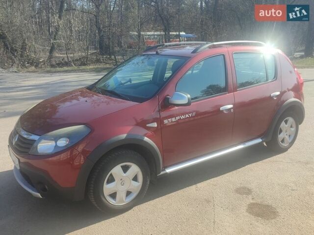 Червоний Рено Сандеро, об'ємом двигуна 1.6 л та пробігом 241 тис. км за 7000 $, фото 1 на Automoto.ua