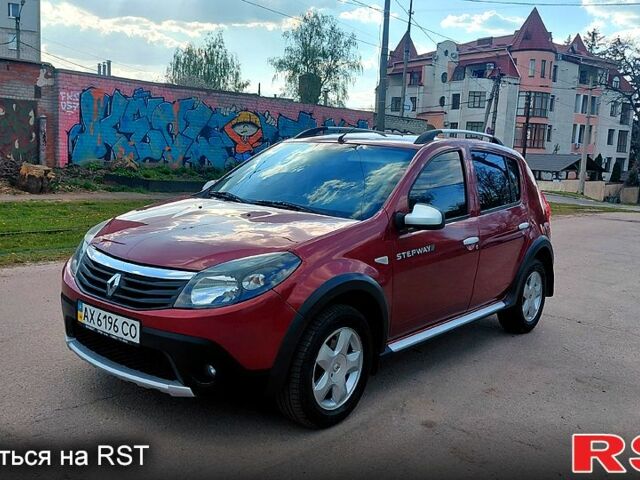 Красный Рено Сандеро, объемом двигателя 1.6 л и пробегом 104 тыс. км за 6850 $, фото 1 на Automoto.ua