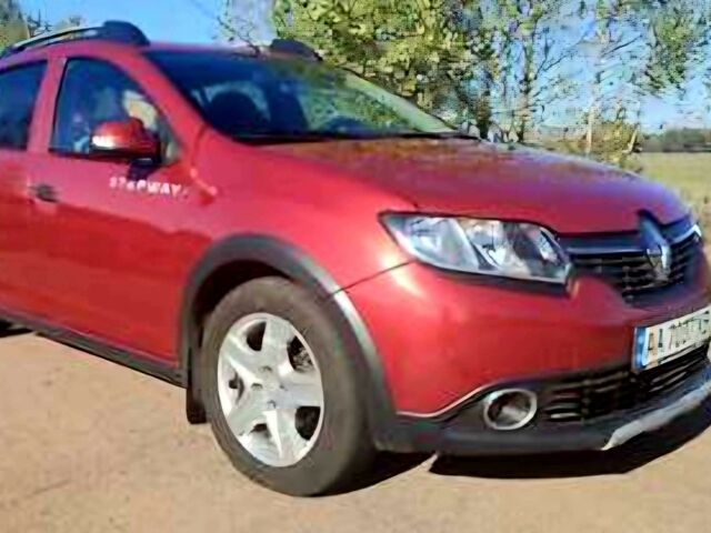 Красный Рено Сандеро, объемом двигателя 1.5 л и пробегом 162 тыс. км за 7500 $, фото 1 на Automoto.ua