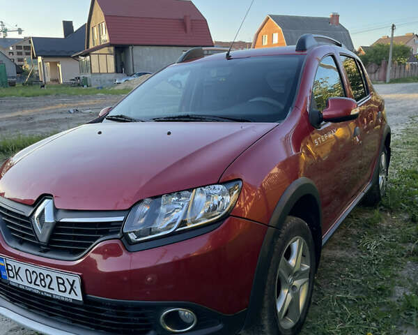 Червоний Рено Сандеро, об'ємом двигуна 1.46 л та пробігом 125 тис. км за 8300 $, фото 1 на Automoto.ua