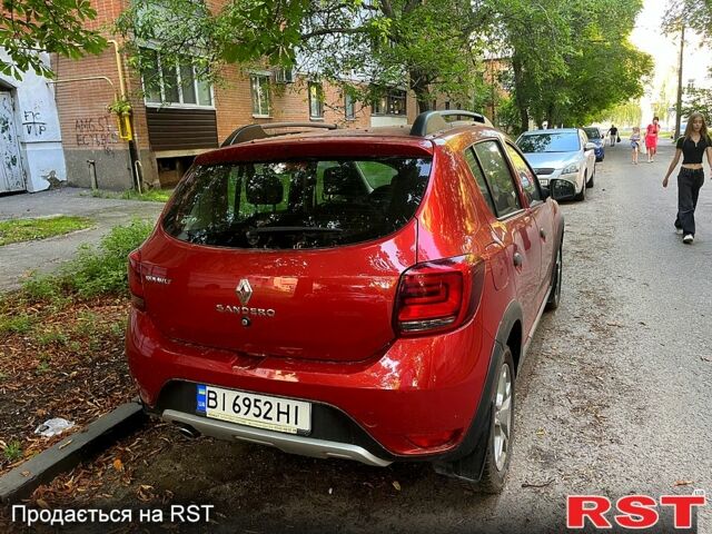 Червоний Рено Сандеро, об'ємом двигуна 1.5 л та пробігом 120 тис. км за 9300 $, фото 1 на Automoto.ua
