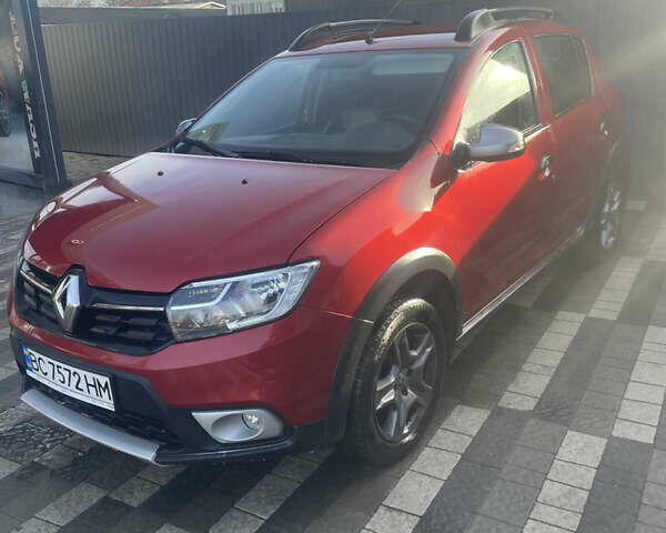 Красный Рено Сандеро, объемом двигателя 1.46 л и пробегом 55 тыс. км за 12100 $, фото 1 на Automoto.ua