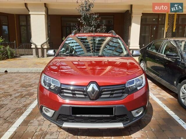 Красный Рено Сандеро, объемом двигателя 0.9 л и пробегом 38 тыс. км за 11700 $, фото 1 на Automoto.ua