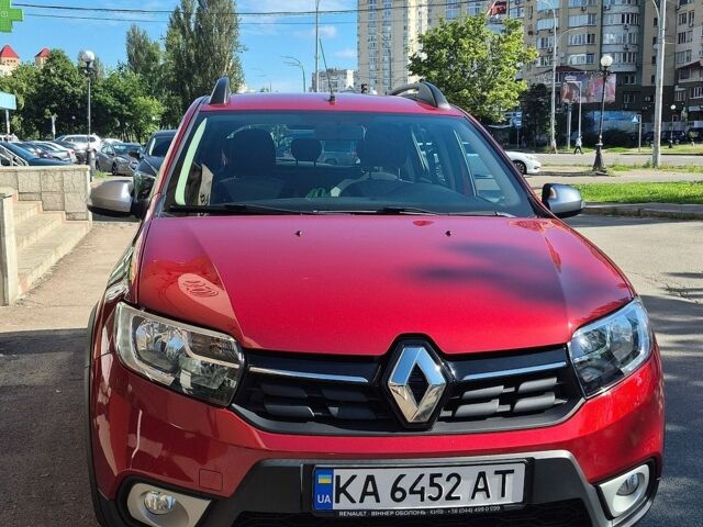 Красный Рено Сандеро, объемом двигателя 0.9 л и пробегом 98 тыс. км за 9400 $, фото 1 на Automoto.ua