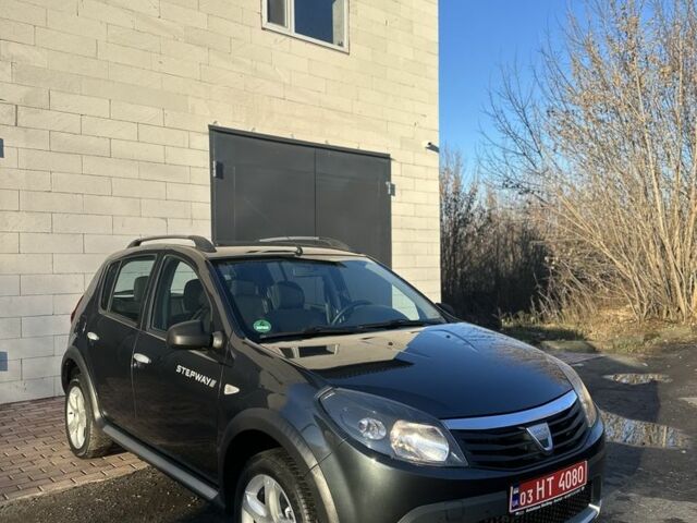 Серый Рено Сандеро, объемом двигателя 1.6 л и пробегом 180 тыс. км за 6599 $, фото 1 на Automoto.ua