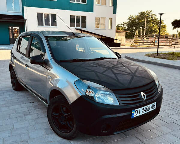 Синий Рено Сандеро, объемом двигателя 1.39 л и пробегом 159 тыс. км за 3500 $, фото 1 на Automoto.ua