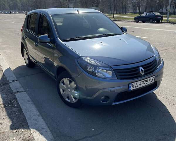 Синий Рено Сандеро, объемом двигателя 1.6 л и пробегом 89 тыс. км за 5400 $, фото 1 на Automoto.ua