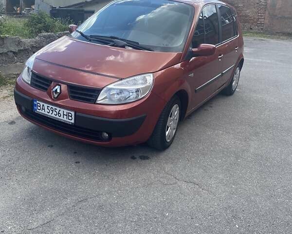 Красный Рено Сценик, объемом двигателя 1.6 л и пробегом 255 тыс. км за 4600 $, фото 1 на Automoto.ua