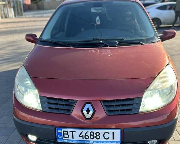 Красный Рено Сценик, объемом двигателя 1.6 л и пробегом 220 тыс. км за 5699 $, фото 1 на Automoto.ua