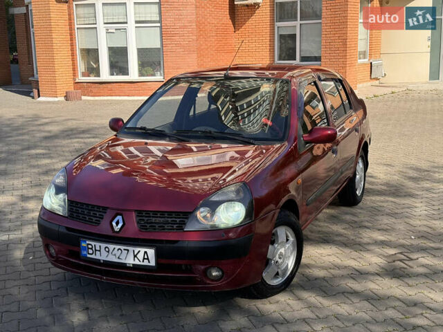 Красный Рено Clio Symbol, объемом двигателя 1.4 л и пробегом 421 тыс. км за 2777 $, фото 1 на Automoto.ua
