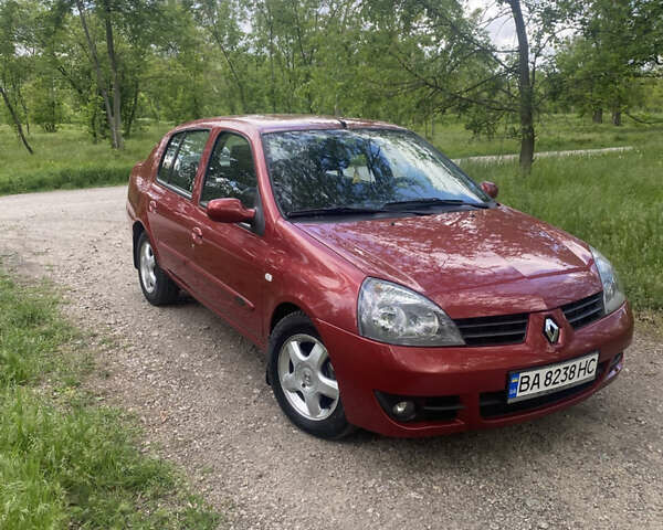 Красный Рено Clio Symbol, объемом двигателя 1.4 л и пробегом 136 тыс. км за 4800 $, фото 1 на Automoto.ua