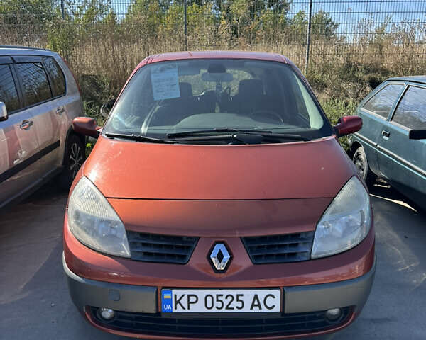 Красный Рено Megane Scenic, объемом двигателя 2 л и пробегом 230 тыс. км за 4500 $, фото 1 на Automoto.ua