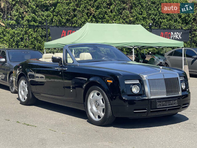 Черный Ролс Ройс Phantom Drophead Coupe, объемом двигателя 6.75 л и пробегом 124 тыс. км за 220000 $, фото 1 на Automoto.ua