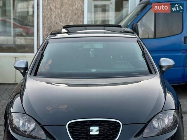 Чорний Сеат Leon, об'ємом двигуна 2 л та пробігом 200 тис. км за 8699 $, фото 1 на Automoto.ua