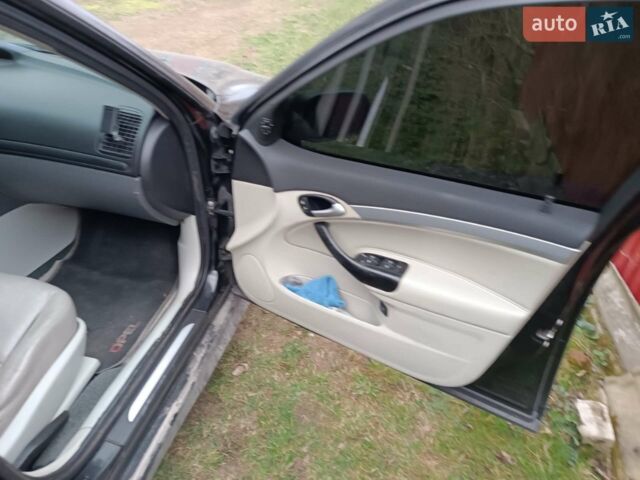 Черный Сааб 9-3, объемом двигателя 2 л и пробегом 374 тыс. км за 3800 $, фото 1 на Automoto.ua