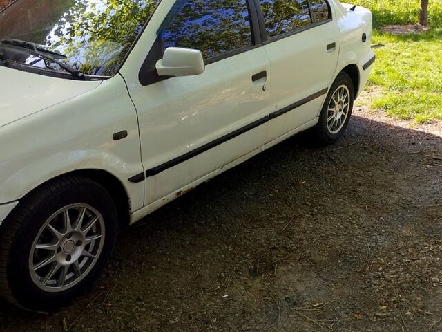 Белый Саманд ЕЛ, объемом двигателя 1.8 л и пробегом 380 тыс. км за 1700 $, фото 1 на Automoto.ua